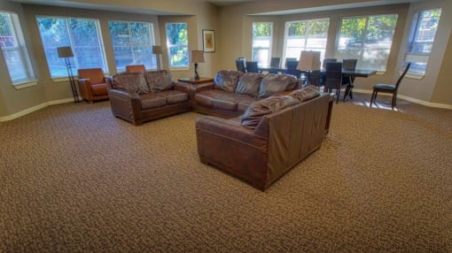 a living room with two couches and a dining room table at Troutdale Terrace, Oregon 97060