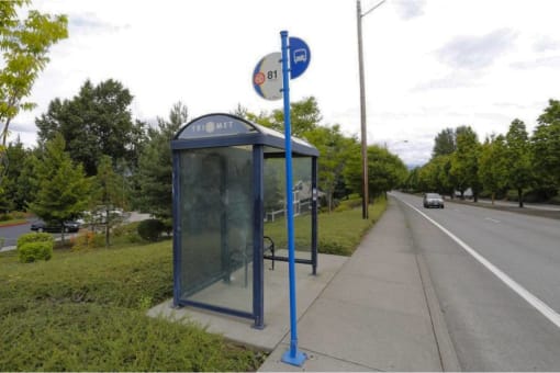 a bus stop on the side of a road at Troutdale Terrace, Troutdale, Oregon