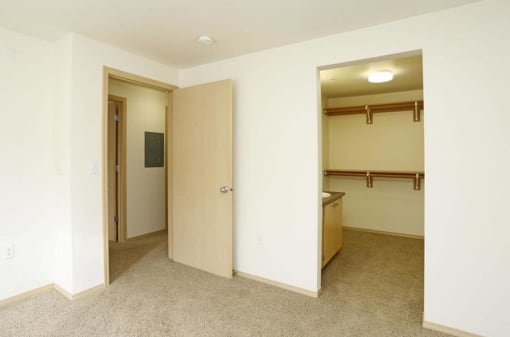 an empty room with a bathroom and an open door at Troutdale Terrace, Oregon