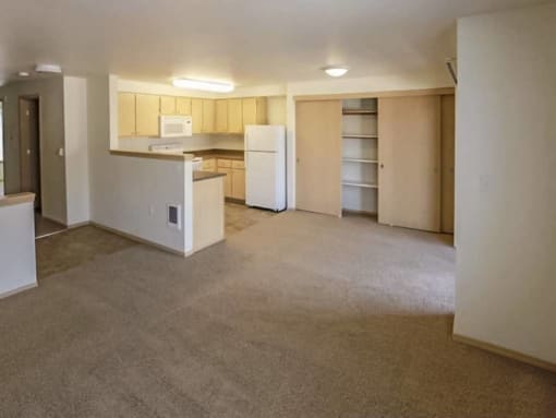 an empty room with a counter in the middle of it at Troutdale Terrace, Troutdale, Oregon