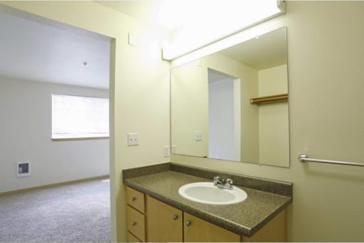 a bathroom with a sink toilet at Troutdale Terrace, Troutdale, OR 97060