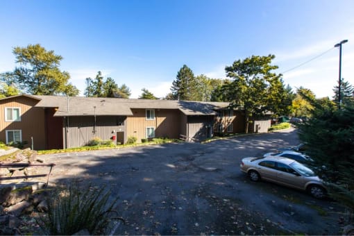 Distant photo of apartment building at Whisperwood, Washington