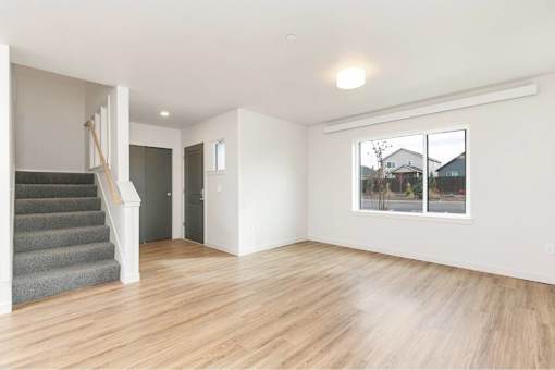 Room with a staircase at Bridge Meadows Redmond Apartments, Redmond, 97756
