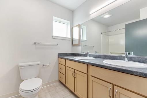 Bathroom with mirror at Bridge Meadows Redmond Apartments, Redmond