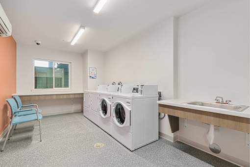 Laundry room at Bridge Meadows Redmond Apartments, Redmond, Oregon