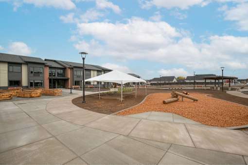 Playground area at Bridge Meadows Redmond Apartments, Redmond, OR