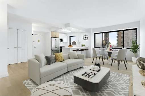 A modern living room with a grey sofa and a coffee table.