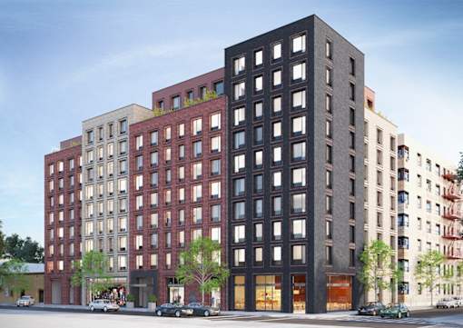 A large multi-story building with a red brick facade.