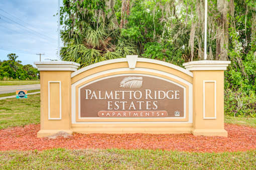 Property Sign at PALMETTO RIDGE Apartments, TITUSVILLE, FL
