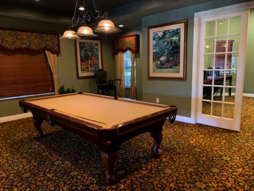 Renaissance game room with pool table