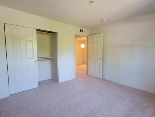 Large bedroom with closet space at DOVER WOODS SENIOR APARTMENTS, Fairfield