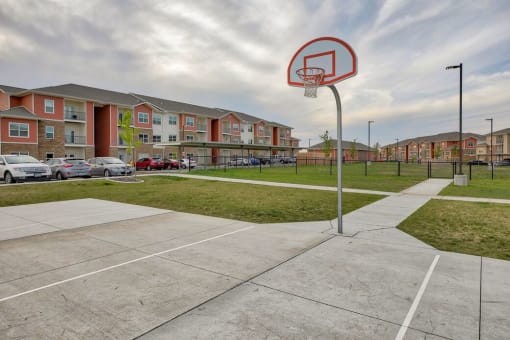 Basketball court near grass at Salish Flats APARTMENTS, Airway Heights, WA 99001