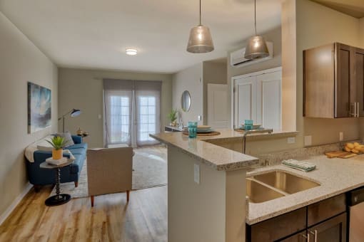 Living Room with Hardwood Style Flooring, Overhead lighting, and High Ceilings at Salish Flats APARTMENTS, Washington