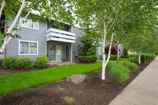 East Portland Apartments- Township Eastside- Landscaping with Building Balconies and Sidewalk Access at Township Eastside, Portland, OR