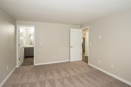 bedroom with bathroom and carpet at Township Eastside, Portland, OR, 06489