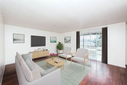 2 BR Apartments in Gresham OR - Township Eastside - Living Room with Wood-Style Flooring, Couch, Chairs, Coffee Table, Area Rug, TV, and Sliding Glass Door at Township Eastside, Portland, 97236