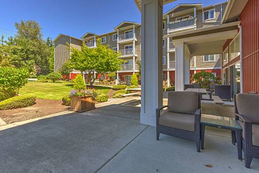 Patio Seating at VINTAGE AT HOLLY VILLAGE SENIORS Apartments, Everett, Washington, 98204
