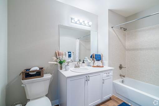 White bathroom at Vintage at Marine View Senior 55+, Washington