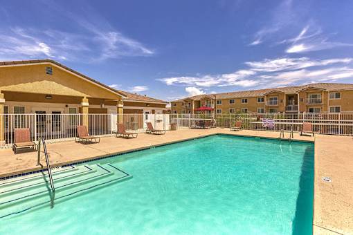 Pool with Lounge Chairs at VISTA CREEK Apartments, Laughlin Nevada