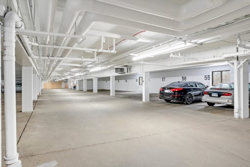 Stratford Wood Apartments and Townhomes in Minnetonka, MN Photo of a parking garage with cars parked in it