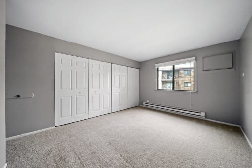 spacious bedroom with large closets