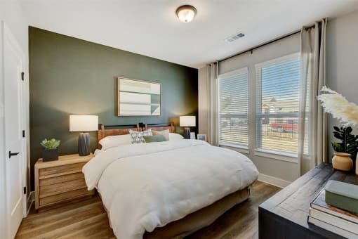 Denton, TX Rental Homes - Carmel Villas - Spacious Bedroom With Two Large Windows For Natural Sunlight And Wood Vinyl Plank Flooring