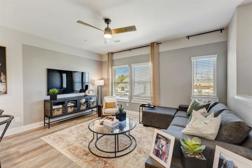 a living room with a couch and a table