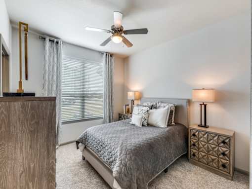 Comfortable bedroom in apartments for rent in Georgetown TX near Kalahari Resort
