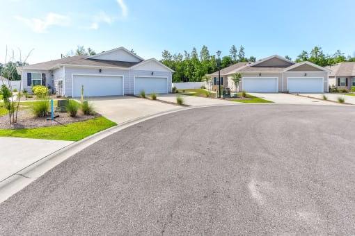 a house with a street in front of it