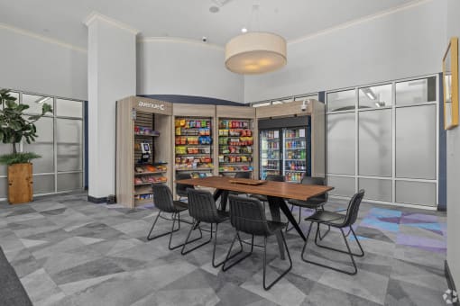 a dining room with a table and chairs