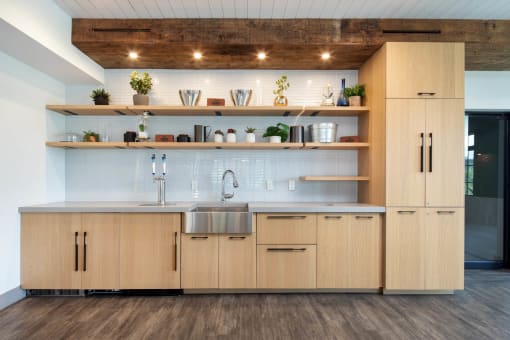 a kitchen with wooden cabinets and a sink