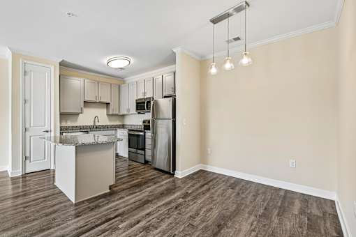 Bright Hawks Landing kitchen with full stainless-steel appliance package and spacious island seating