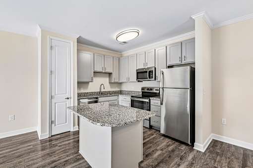 Modern Hawks Landing kitchen in Hickory NC with stainless-steel appliances and a large island