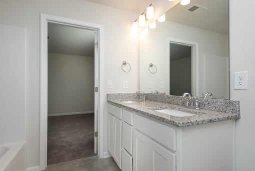 Pine Ridge Place Rental Home with granite countertops in bathroom