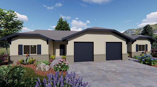 A modern house with a large front yard and a driveway.