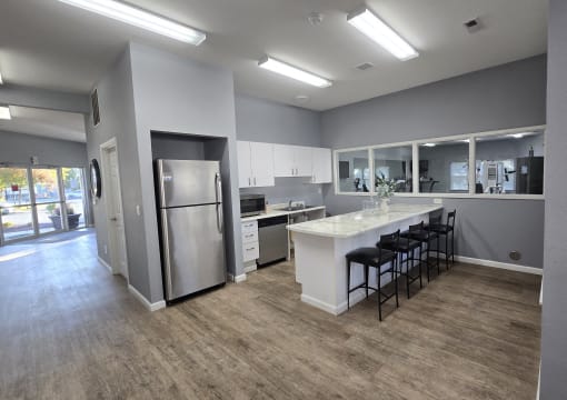 a kitchen and dining area in a new home