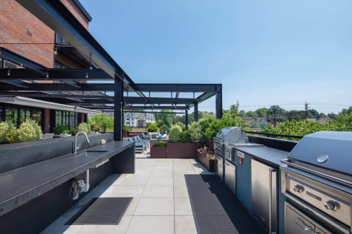 a kitchen with stainless steel appliances and a patio