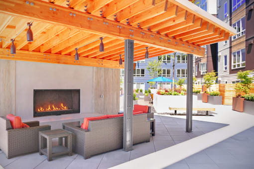 Apartments for Rent in Kirkland, WA - Kirkland Crossing - Rooftop Patio with Lounge Seating and Fireplace.
