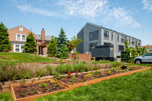 a community garden in front of a house