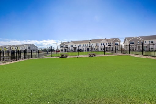 the preserve at ballantyne commons apartments with a large green field
