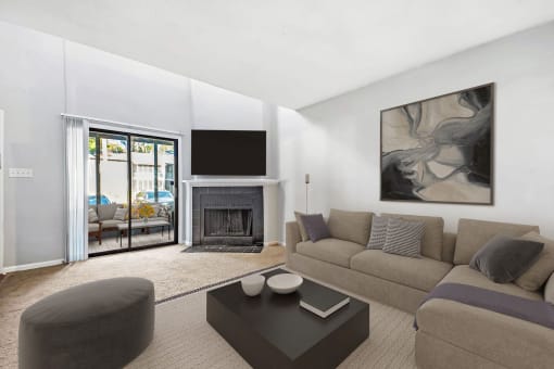 Greentree Apartments in Savannah, GA photo of a living room with a couch and a coffee table