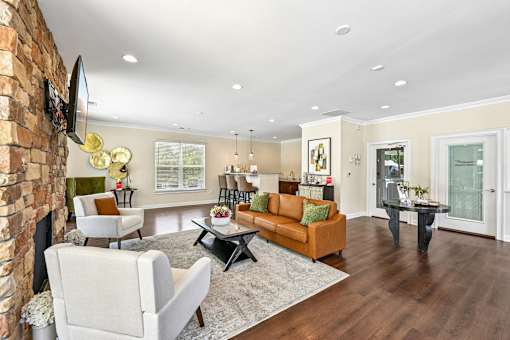 A living room with a fireplace and a couch.