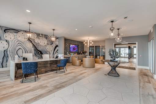 A modern living room with a zebra print wallpaper and a TV mounted on the wall.