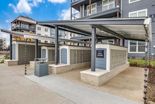 A parking structure with a sign that says "MAR CENTER" on it.
