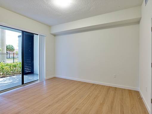 Stylish living room at Gateway Luxury Apartments, featuring contemporary décor, neutral tones, and ample space for comfortable living.