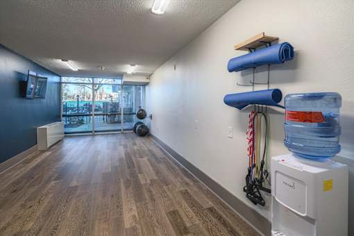 Yoga and wellness room at Idlewild 45 Apartments in Memphis TN with open space and fitness equipment