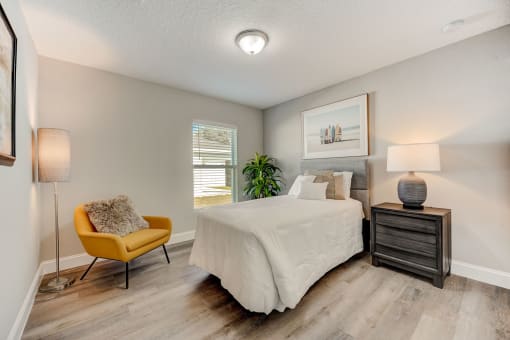 Pet-Friendly Rentals in Lady Lake, FL – The Groves at Lake Ella -of guest bedroom with hardwood floors