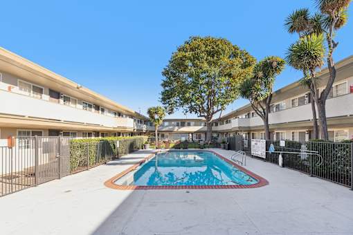 A swimming pool in the middle of a residential area.
