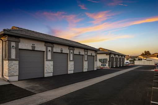 A row of garage doors are closed.