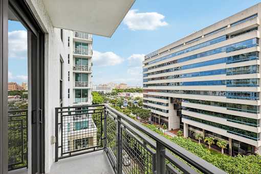 Scenic balcony view from MB Station apartments showcasing Miami city views and convenient access to Coral Gables, Brickell, and Downtown Miami.